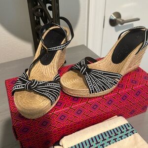 Gently used Tory Burch wedge sandals. Only worn twice. Size 5. Beautiful!